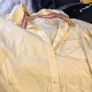 Yellow button up shirt
